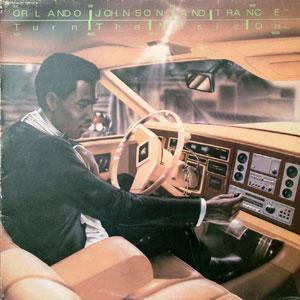 Front Cover Album Orlando Johnson And Trance - Turn The Music On