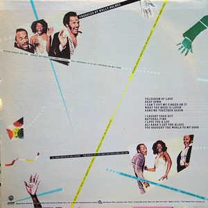 Back Cover Album The Hues Corporation - I Caught Your Act Back Cover Album The Hues Corporation - I Caught Your Act