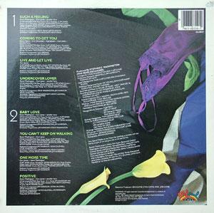 Back Cover Album Aurra - Live And Let Live Back Cover Album Aurra - Live And Let Live