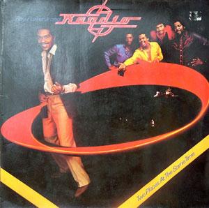 Front Cover Album Raydio - Two Places At The Same Time Front Cover Album Raydio - Two Places At The Same Time