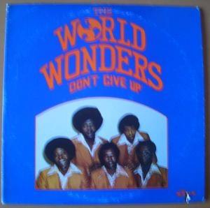 Front Cover Album The World Wonders - Don't Give Up Front Cover Album The World Wonders - Don't Give Up