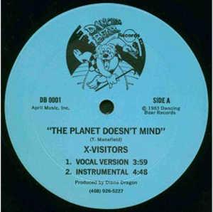 Front Cover Single X-visitors - The Planet Doesn't Mind